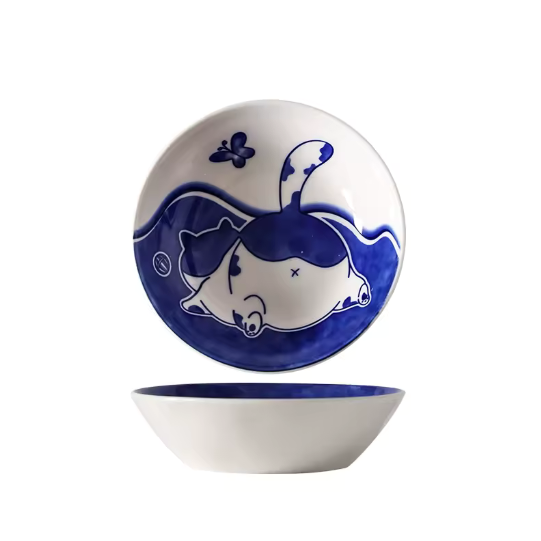 Ceramic bowl with blue and white design on a white background
