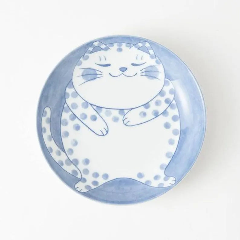 Ceramic plate with a cat design on a white background